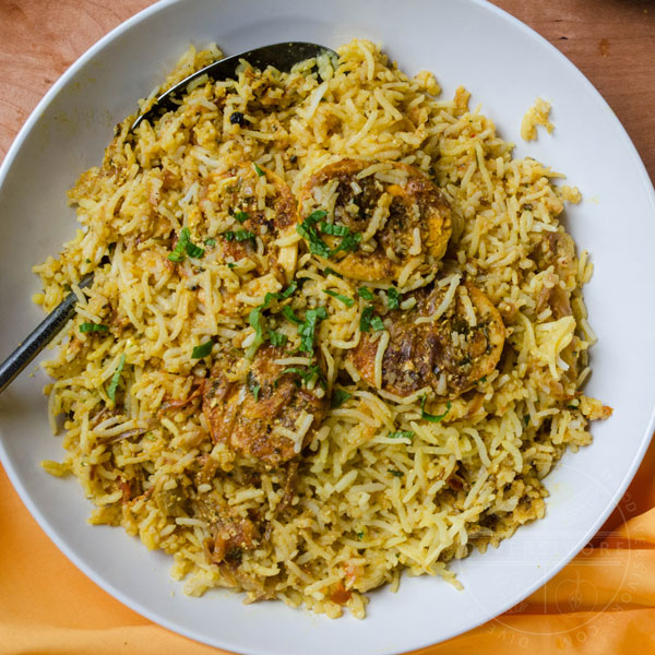 Hyderabadi egg biryani in a large serving bowl