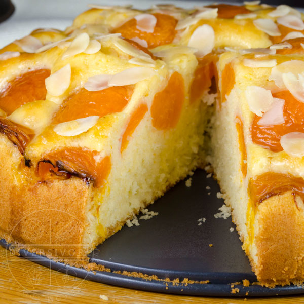 Aprikosenkuchen (German Apricot Cake) with a slice removed