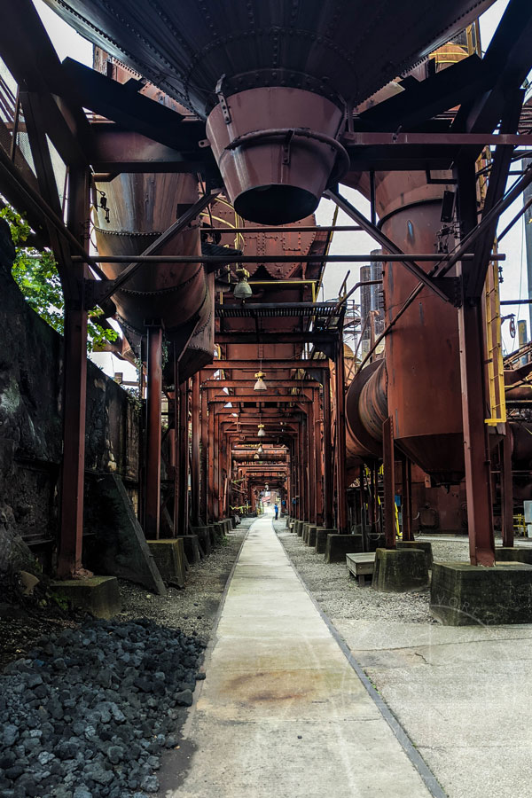 Walkway beneath the old steelwork equipment at Sloss Furnaces, Birmingham, Alabama