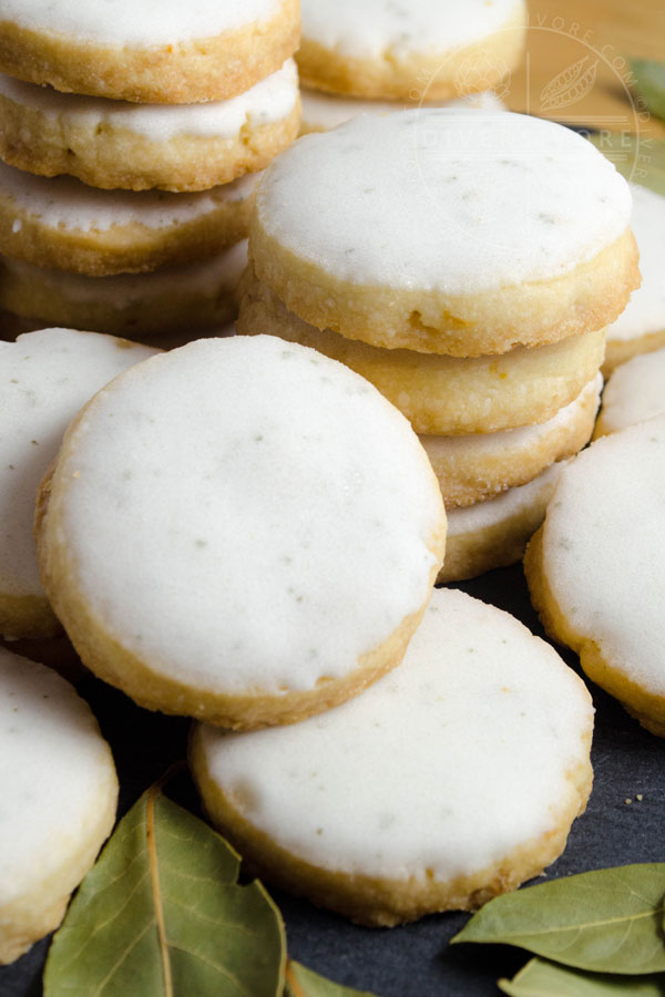 Bay leaf and lemon shortbread cookies, stacked on a table