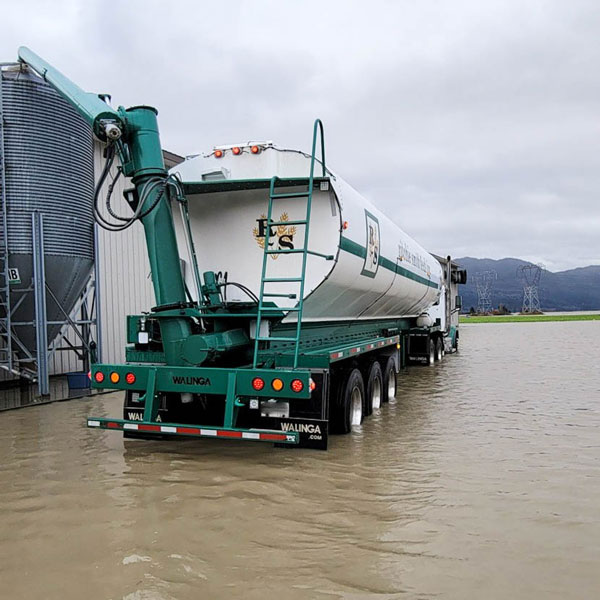Feed truck at a chicken farm during the Fraser River Valley floods of 2021