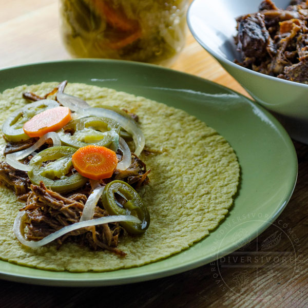 Chiles en escabeche - Mexican pickled carrots and jalapeños served in a taco