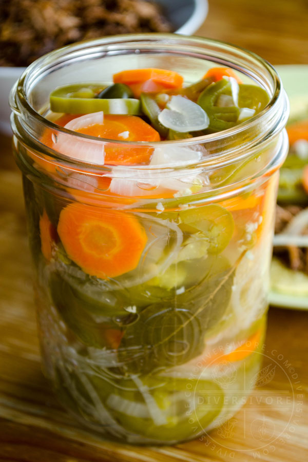 Chiles en escabeche - Mexican pickled carrots and jalapeños in a mason jar
