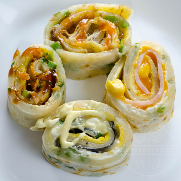 Sliced pieces of Dan Bing (Taiwanese egg crepe) with four different fillings