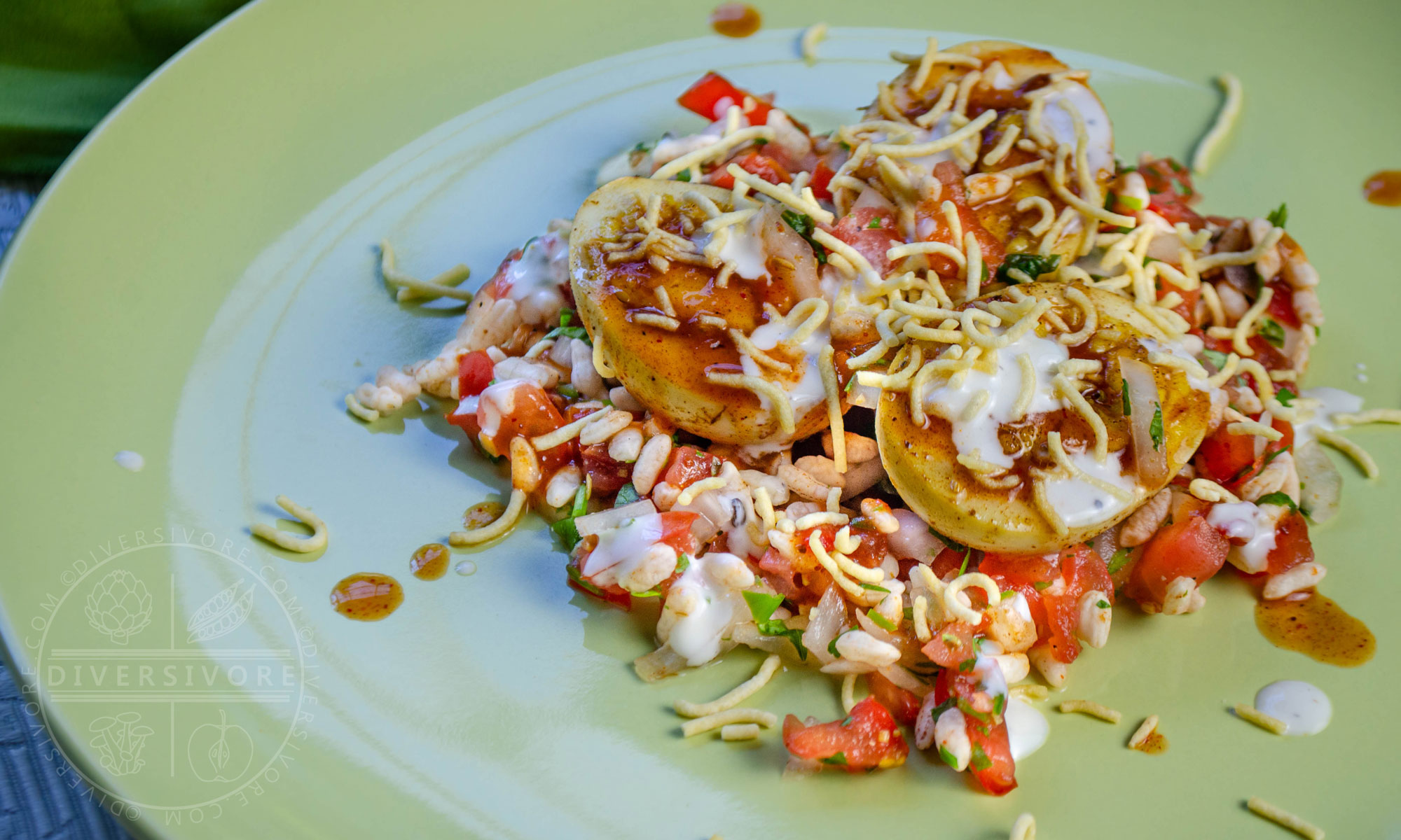 Egg chaat with puffed rice and chutneys