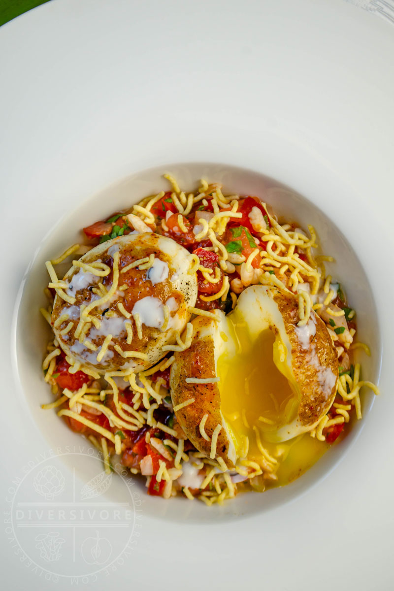 Egg chaat with puffed rice and chutneys